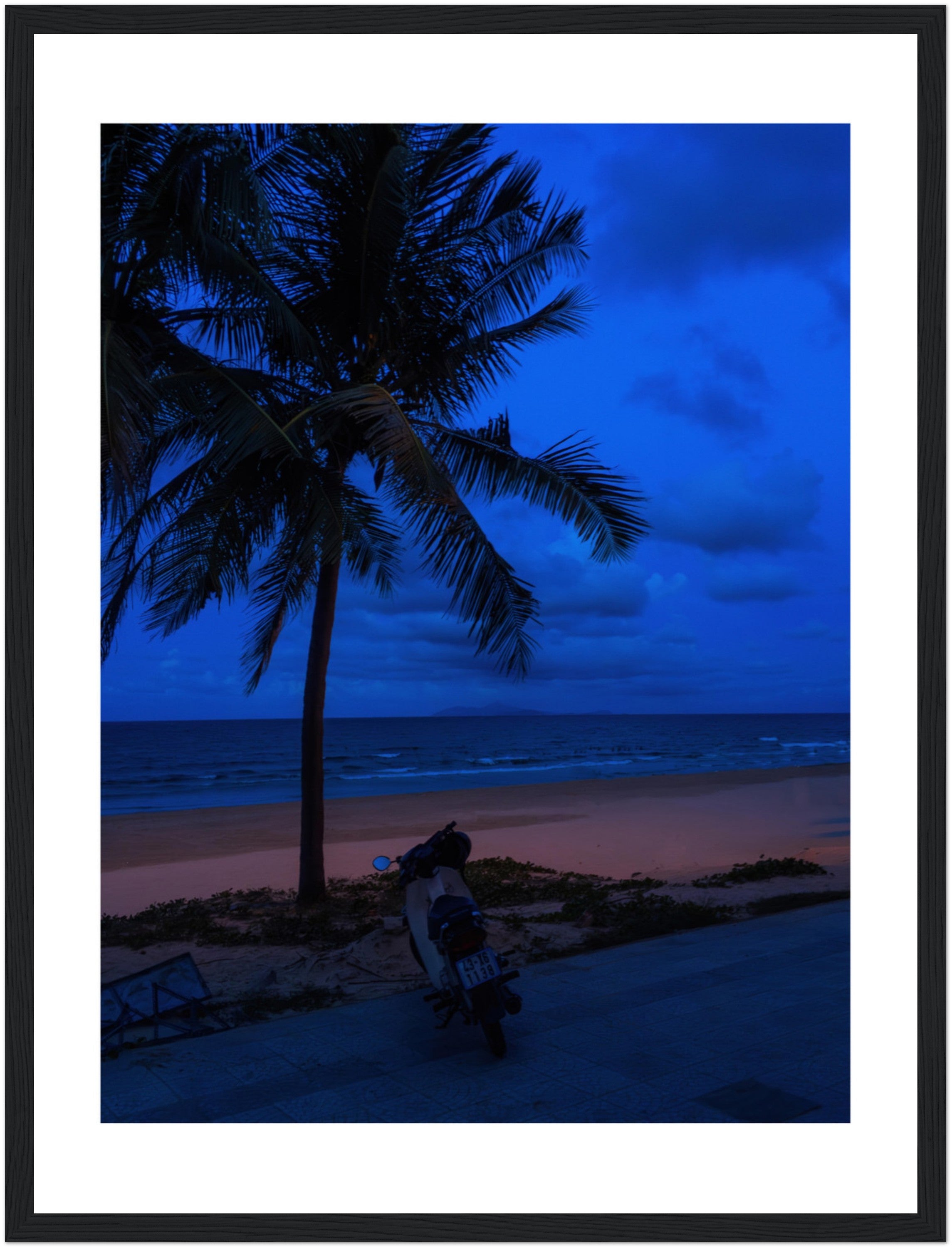 Vietnam's Beach: Motorcycle Rests on Serene Beach | Poster