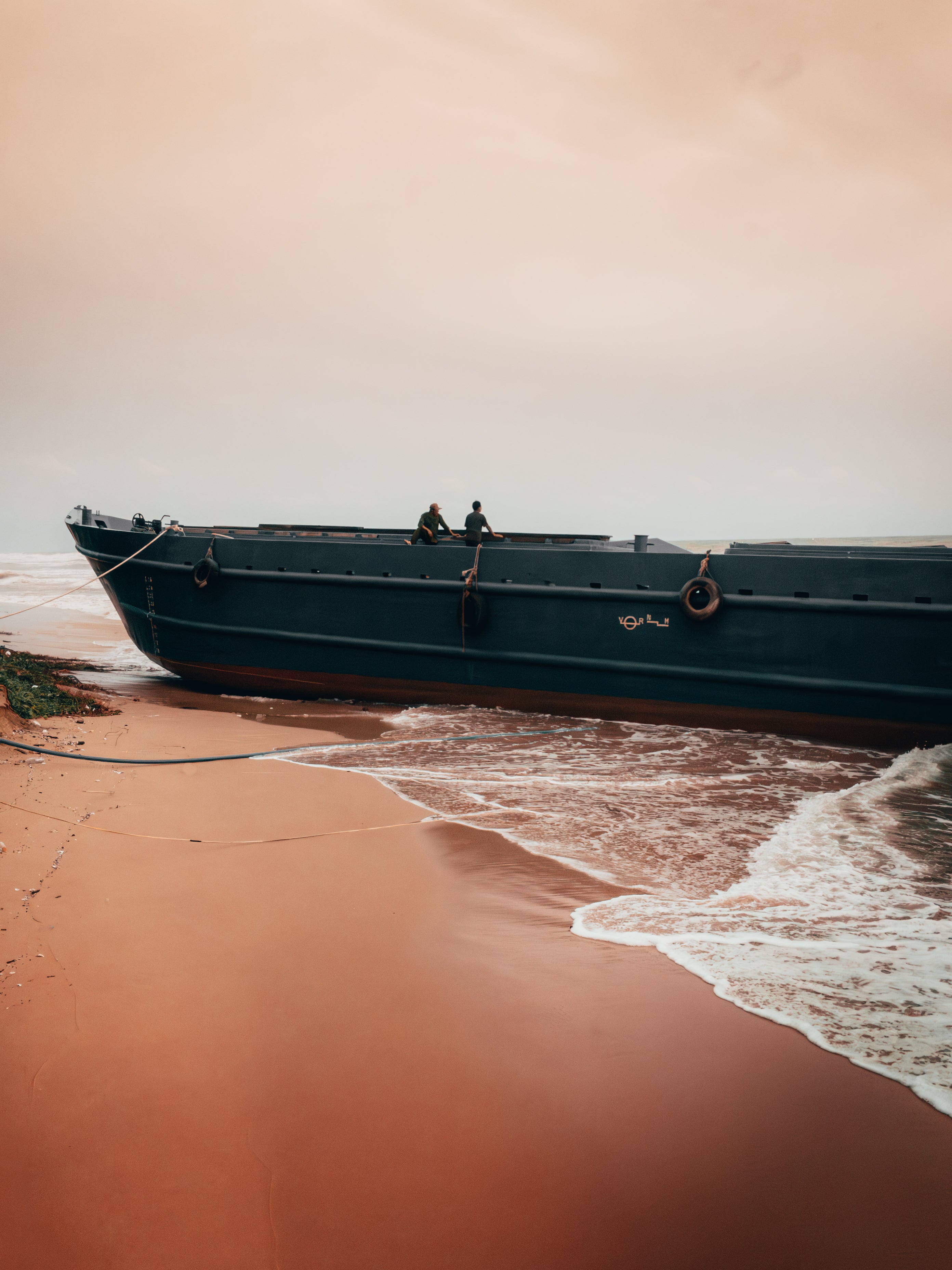 Vietnam Coastal Beauty: Serene Boat Shoreline | Poster